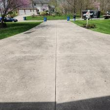 Grind-Shine-Soft-Washes-Janis-House-and-Pressure-Washes-Concrete-in-Hoagland 0